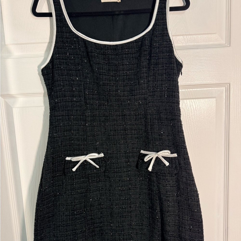 Chic Black Dress with White Trim